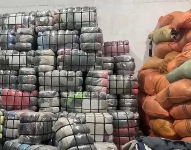 The pre-shipment video: pressed bales of stock, wrapped and stacked
