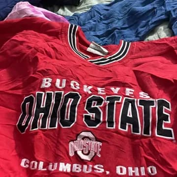 A photo from one of our buyers' daily updates: one piece held up on the stack