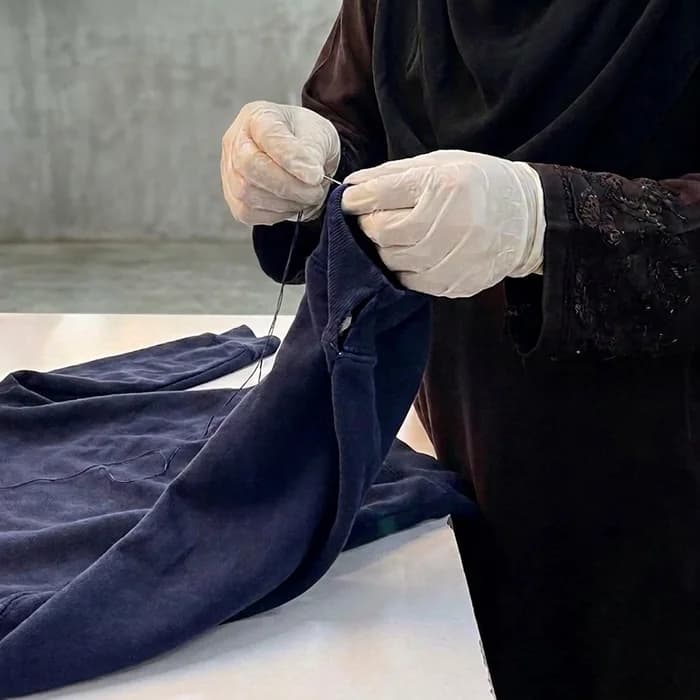 A piece being mended by hand in the process centre