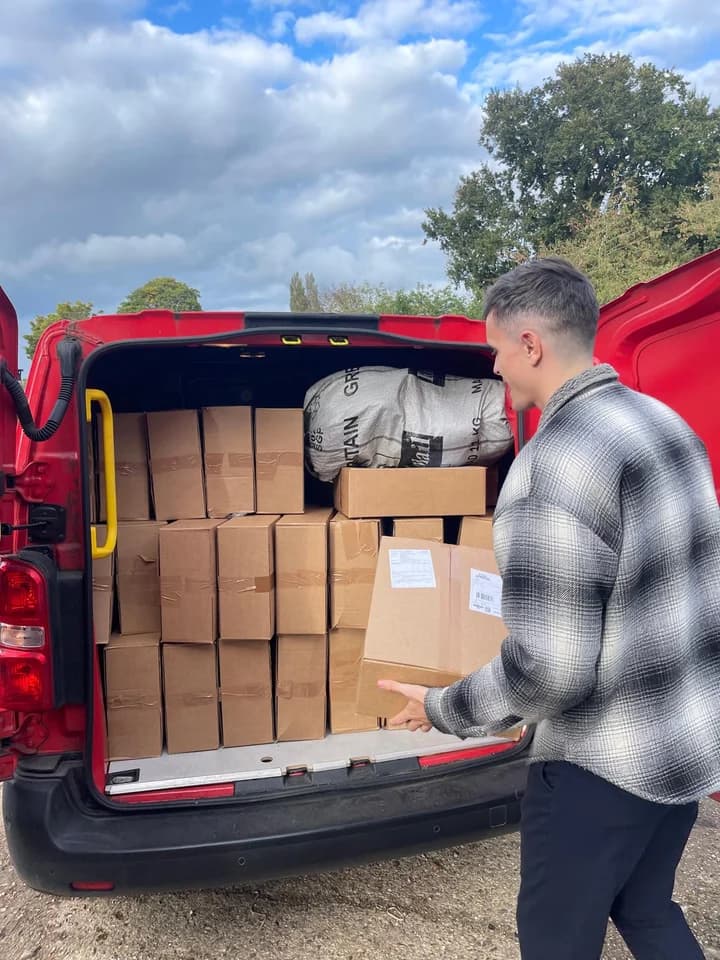 Loading a van full of boxed orders