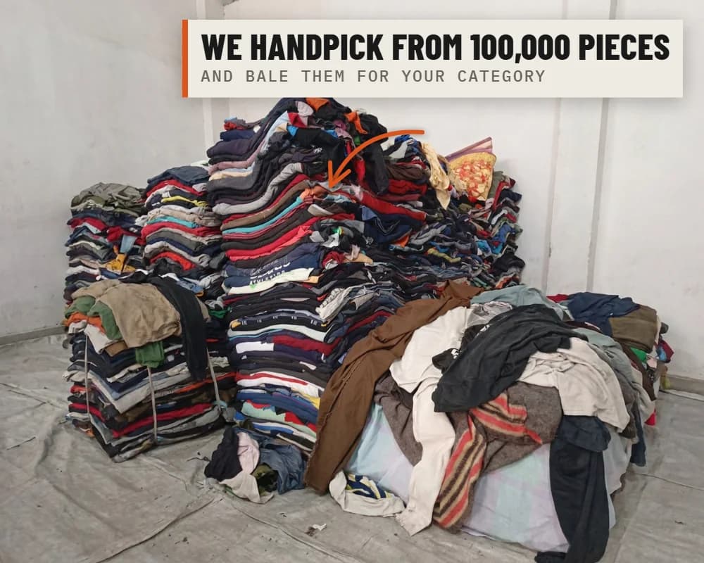 A pile of second-hand clothes in our warehouse, waiting to be sorted